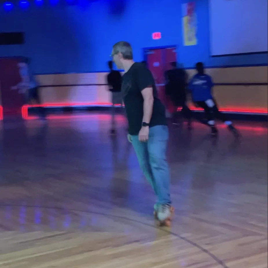 Thad skating backward on the rink