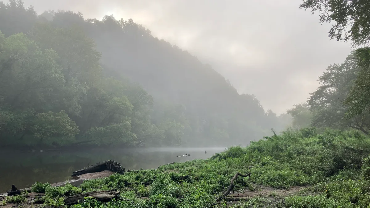 Foggy morning view of the river at Caney Fork, Tennessee