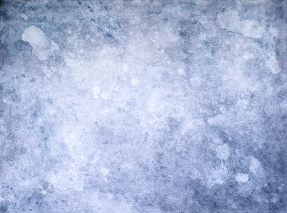 Textured abstract painting in mottled shades of blue